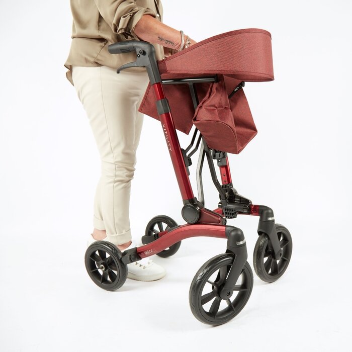 Rollator with double folding system