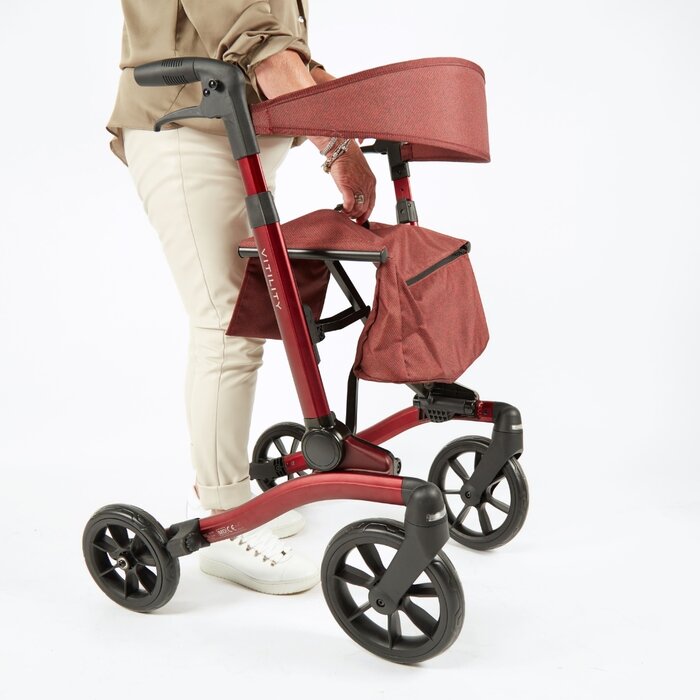 Rollator with double folding system