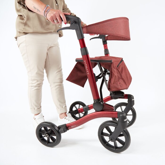 Rollator with double folding system