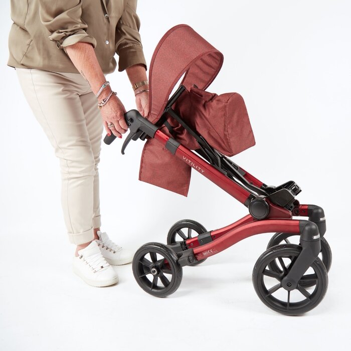 Rollator with double folding system
