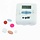 Pill box with 4 sound and/or vibration alarms and 4 medicine compartments. E-pill
