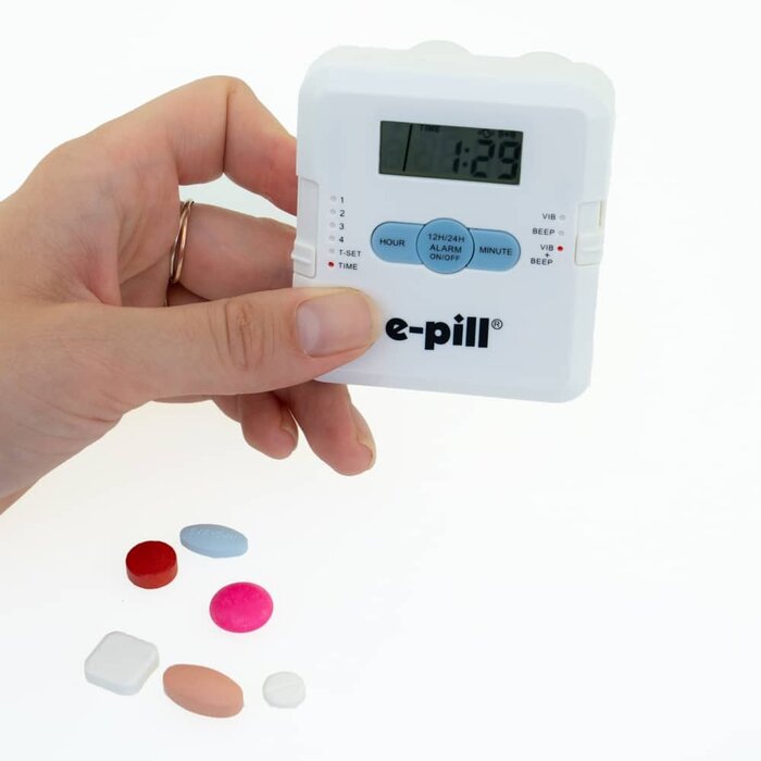 Pill box with 4 sound and/or vibration alarms and 4 medicine compartments. E-pill