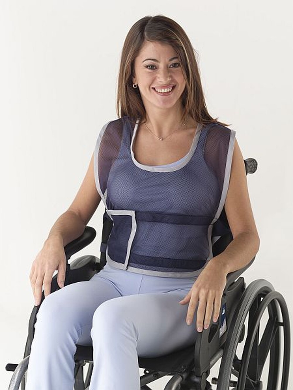 Fixation vest and pelvic fixation vest for wheelchair use