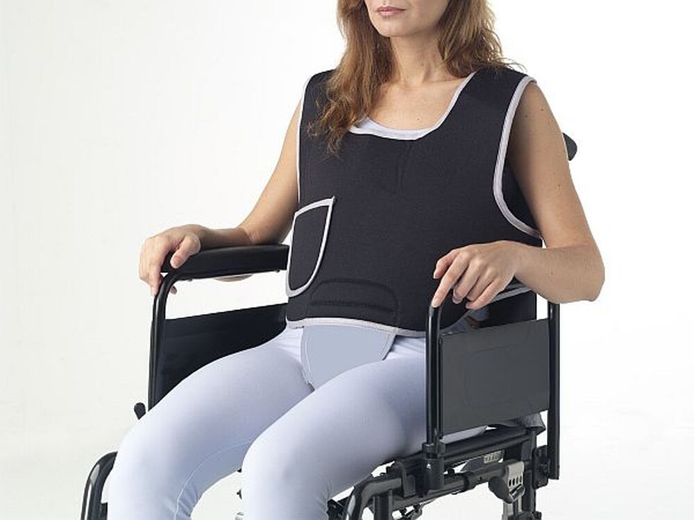 Fixation vest and pelvic fixation vest for wheelchair use