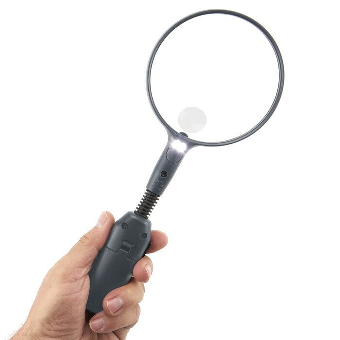 Standing magnifying glass with LED lighting