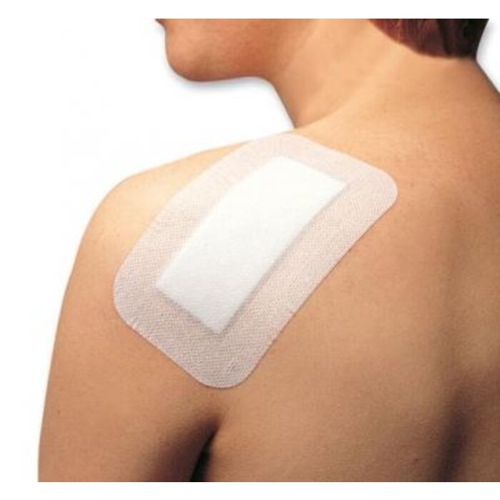 Porefix surgical wound dressing with compress