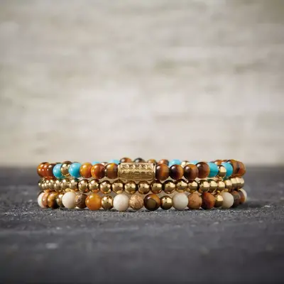 REBEL & ROSE REBEL & ROSE Armband | Mix Tiger Turquoise | Goudkleurig ion-plated | 4 mm | RR-40063-G