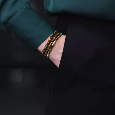 REBEL & ROSE REBEL & ROSE Armband | Mix Tiger Turquoise | Goudkleurig ion-plated | 4 mm | RR-40063-G