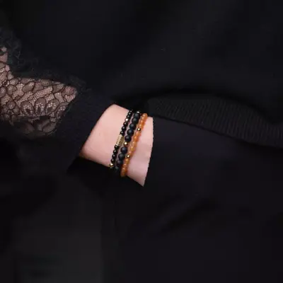 REBEL & ROSE REBEL & ROSE Armband | Matt Black Madonna | Goudkleurig ion-plated | 6 mm  | RR-60078-G