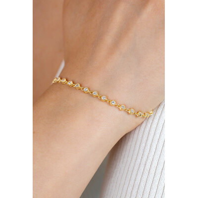 ZINZI ZINZI Armband | Vergulde armband met een speelse rij witte zirkonia’s in ronde zetting | ZIA2893Y