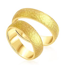 18 karat yellow gold wedding rings with shiny finish