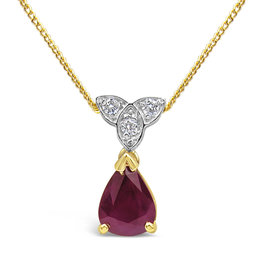 18 karat yellow & white gold pendant with 0.06 ct diamonds & 0.75 ct ruby