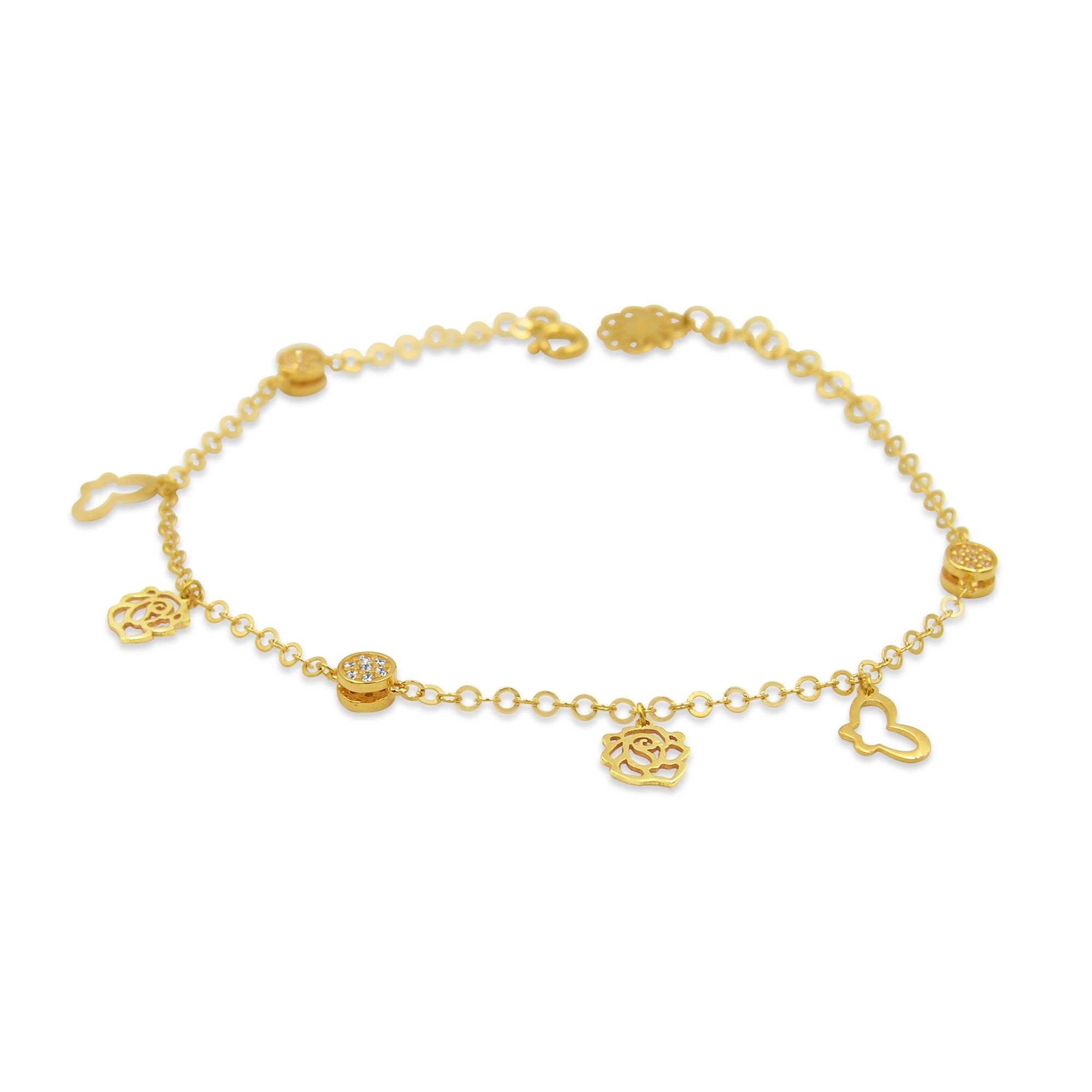 18 kt yellow gold charm bracelet with 3 color gold with zirconia
