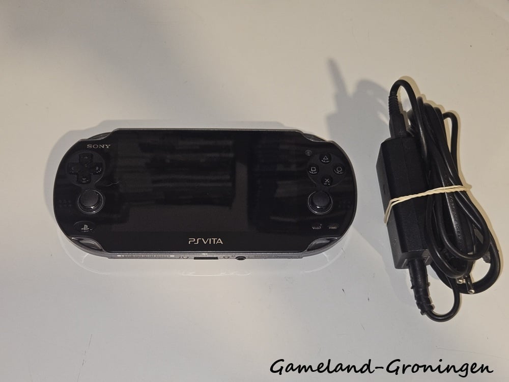 PS Vita PCH-1103 with Memorystick & Charger