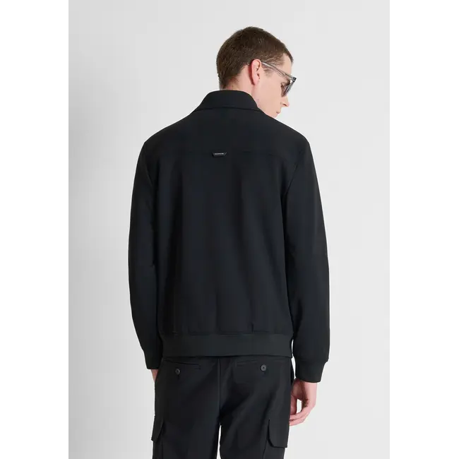 Antony Morato Antony Morato MMCO00966-FA600297 Black regular-fit coat in bi-stretch fabric with logo on metal badge