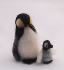 De Wolshoop Pinguin met jong