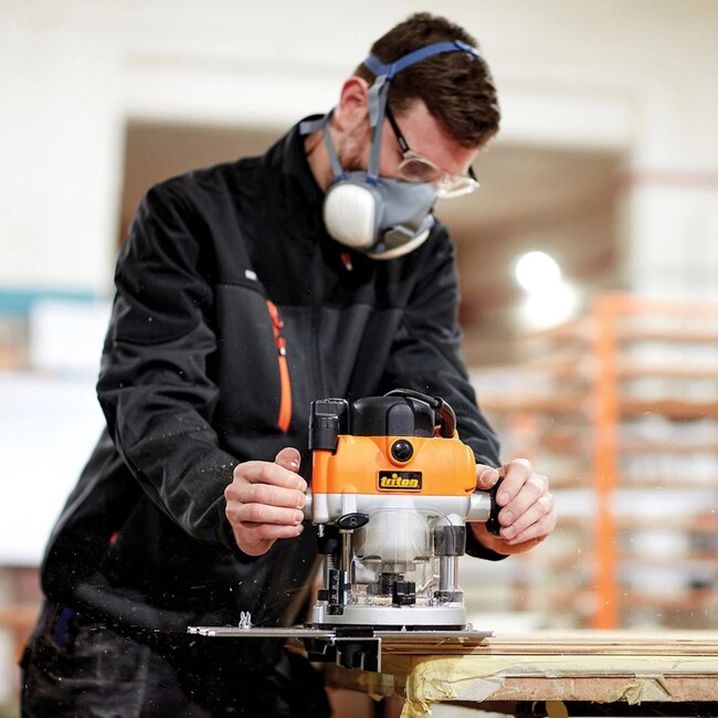 Triton Bovenfrees - metaal en kunststof - 1400 W, inval- en vaste modus - spantangen 6/8/12 mm - oranje - freestafel