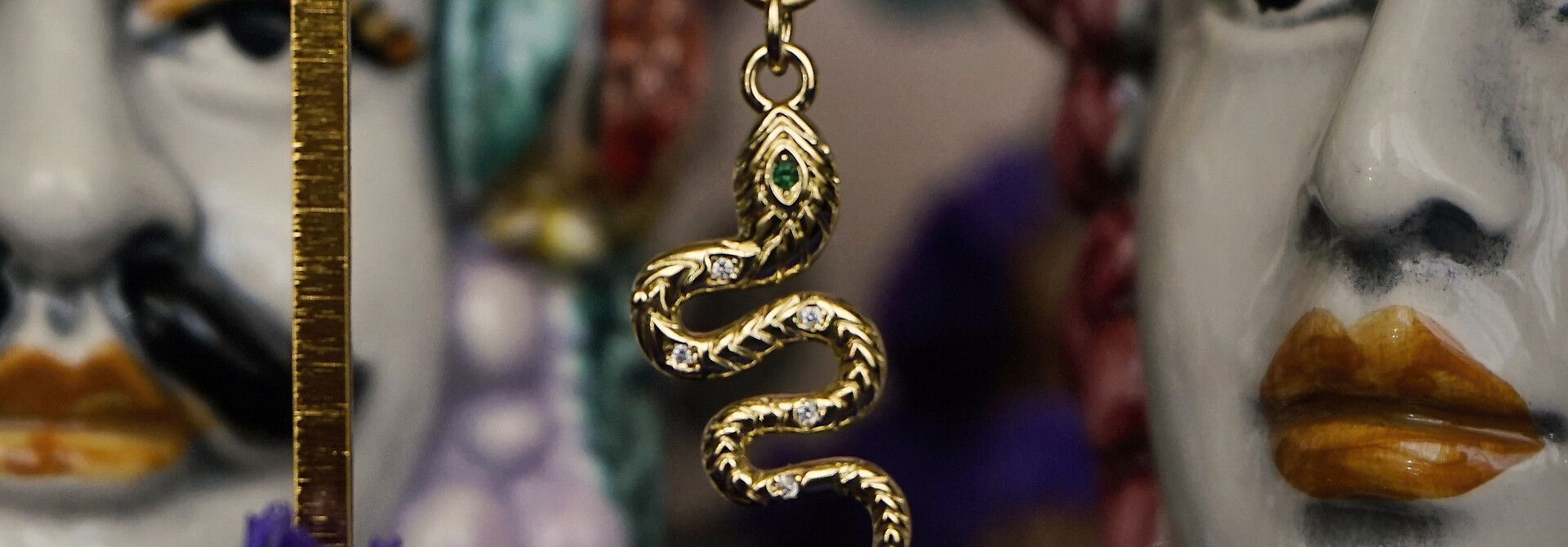 Green Eyed Snake Earring (a piece)