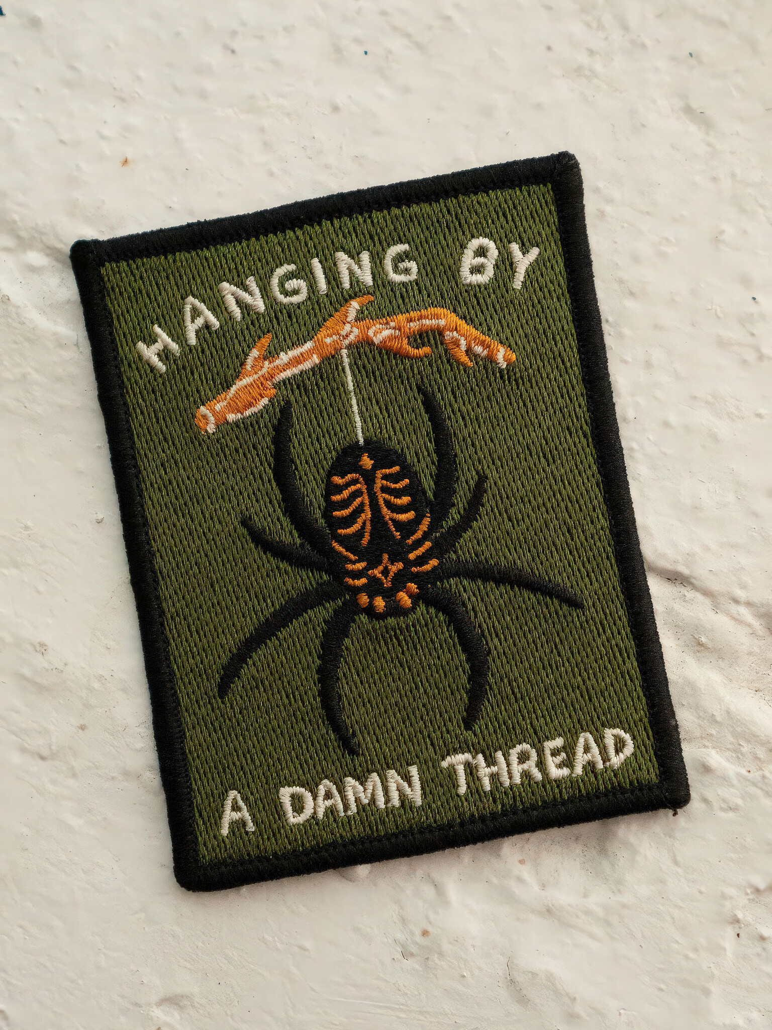 Hanging by a Thread Patch-1