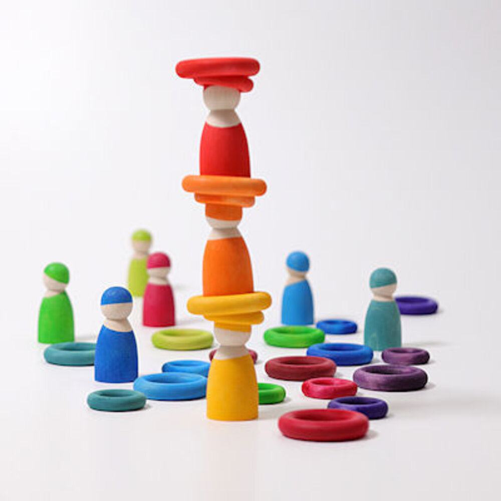 Grimm's 24 houten ringen om mee te bouwen - Regenboog Grimm's 24 houten ringen om mee te bouwen - Regenboog