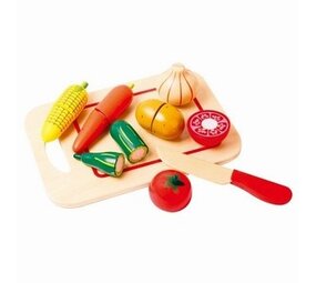 Snijset groenten op snijplank Snijset groenten op snijplank