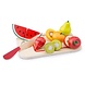 Snijset fruit op snijplank Snijset fruit op snijplank