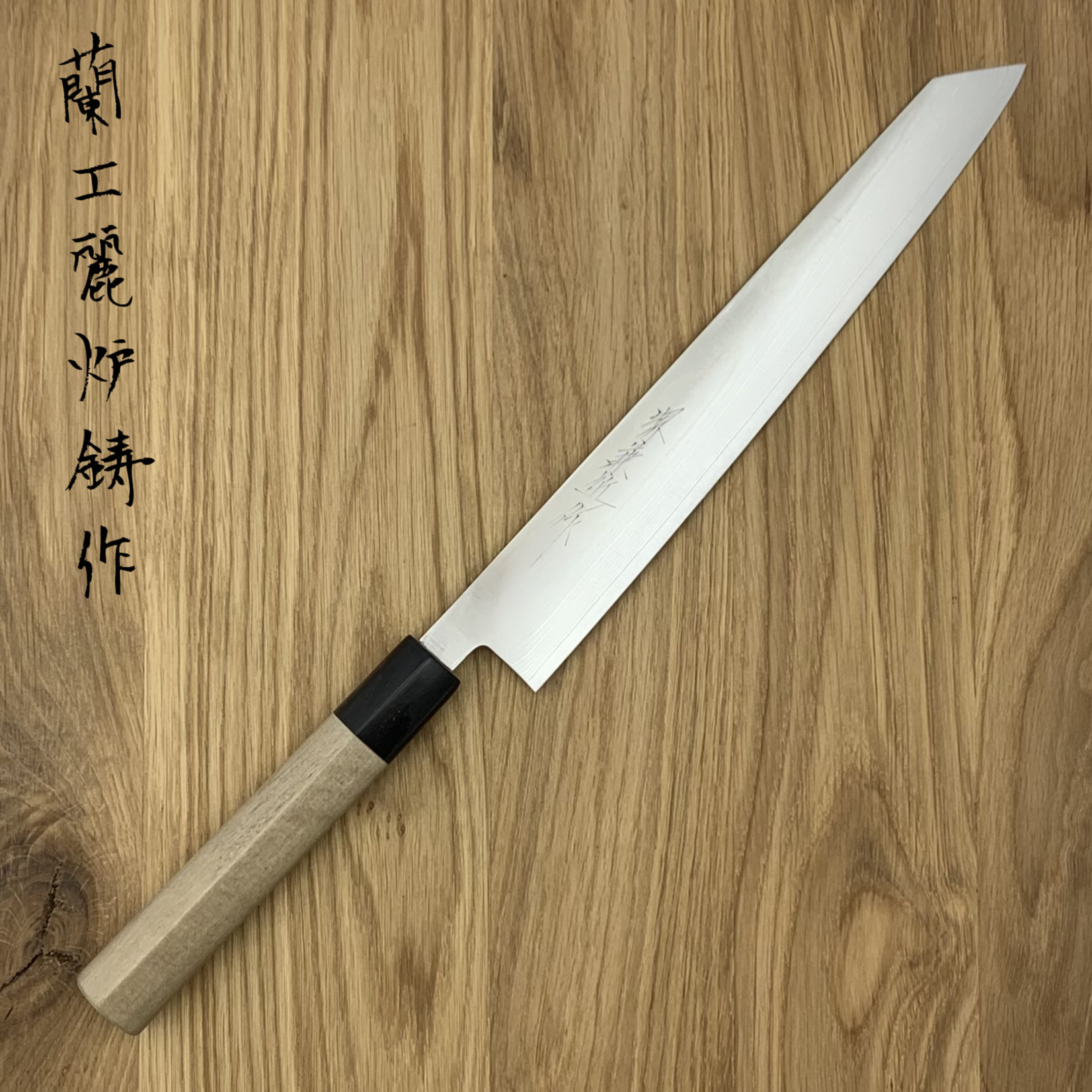 https://cdn.webshopapp.com/shops/241833/files/364034052/1652x1652x2/kanechika-aus10-damascus-slicer-240mm-sk-a1d-ks240.jpg