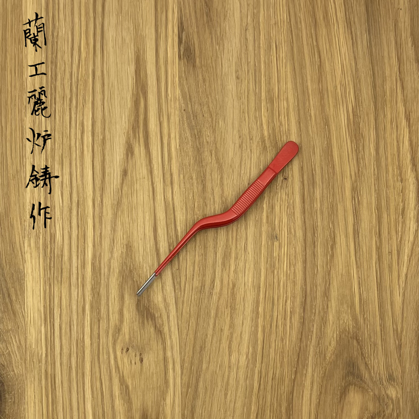 Dresseer pincet gebogen 14 cm rood