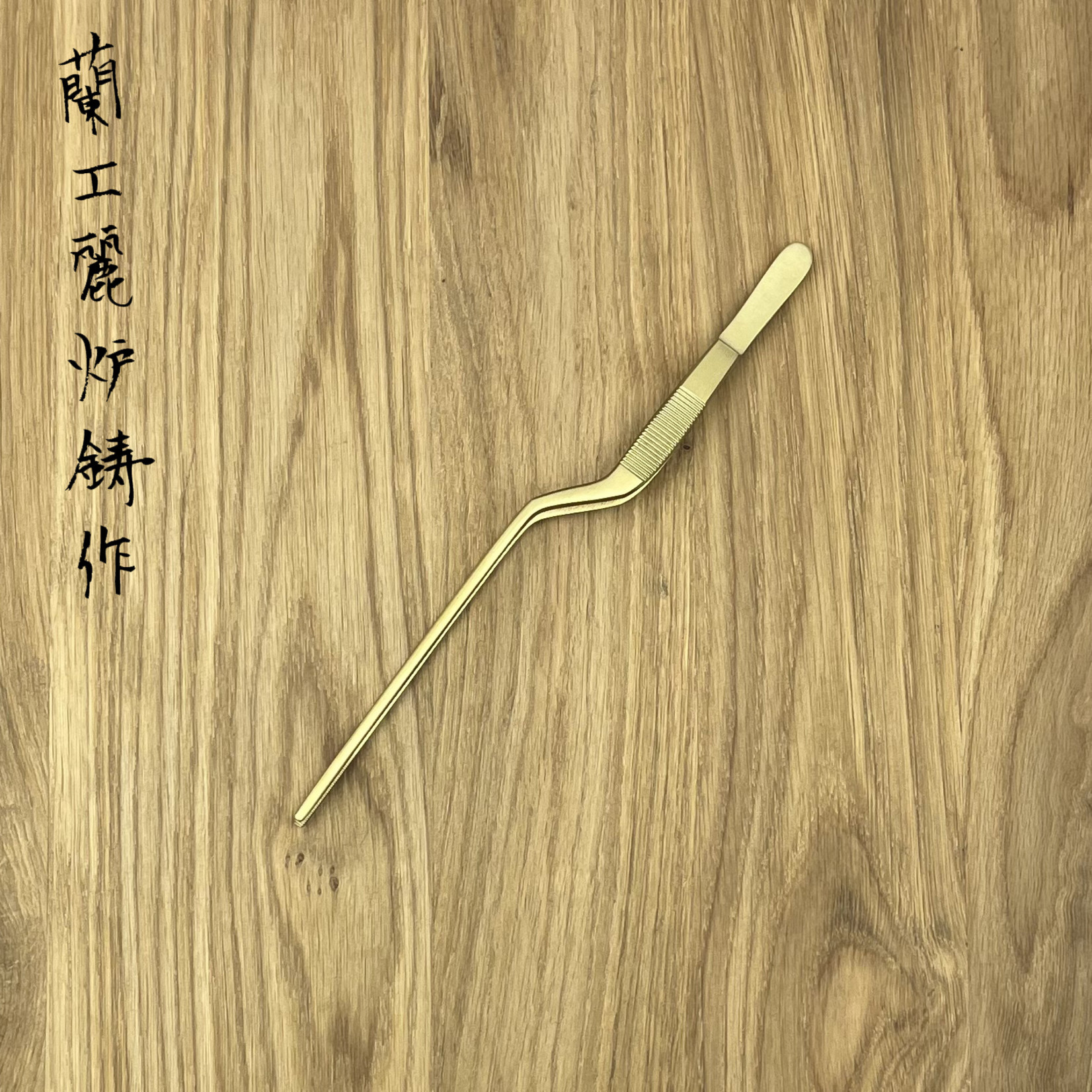 Dresseer pincet gebogen 20 cm goud