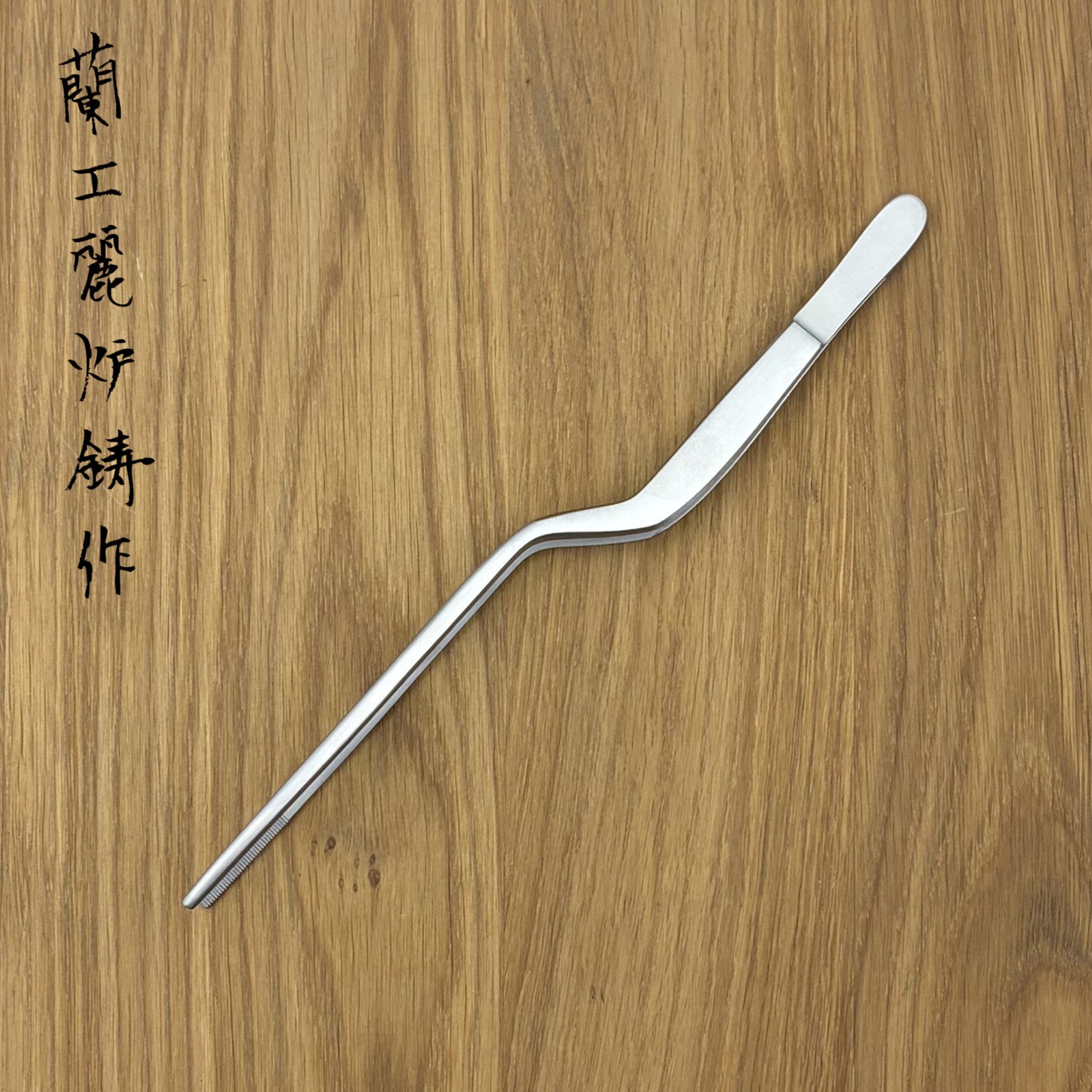 Pincet gebogen 20cm rvs glad