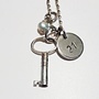 Key with 21 disc and pearl silver necklace