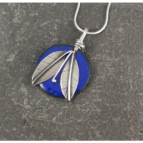 Jane Marshall Round enamel & silver leaf pendant blue 01 Jane Marshall Round enamel & silver leaf pendant blue 01