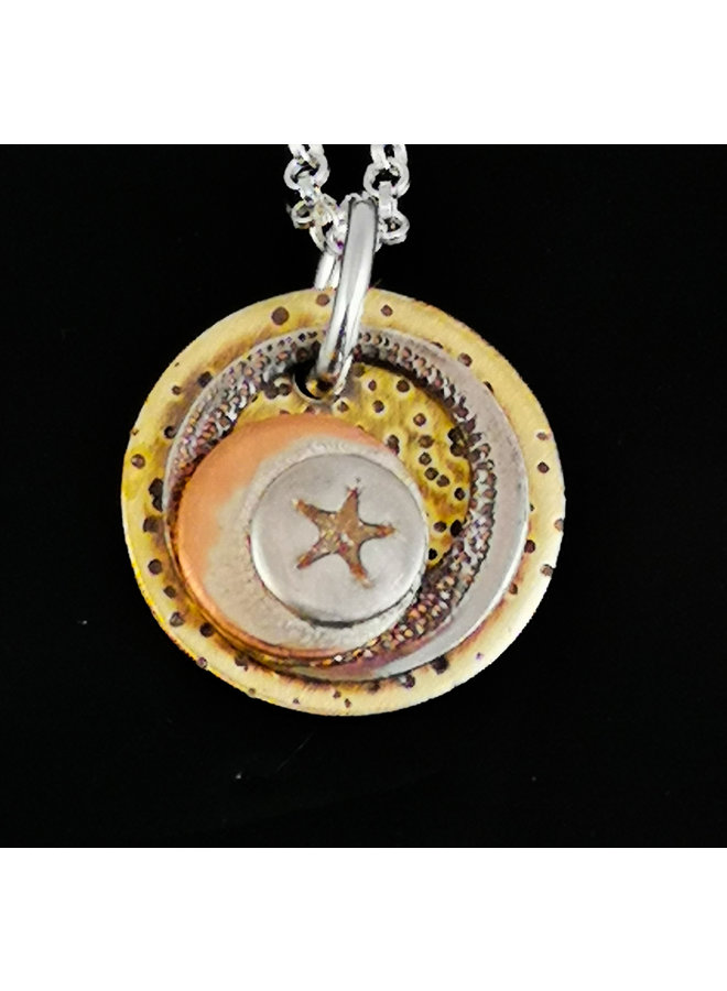 Round brass, copper and silver pendant with star 18