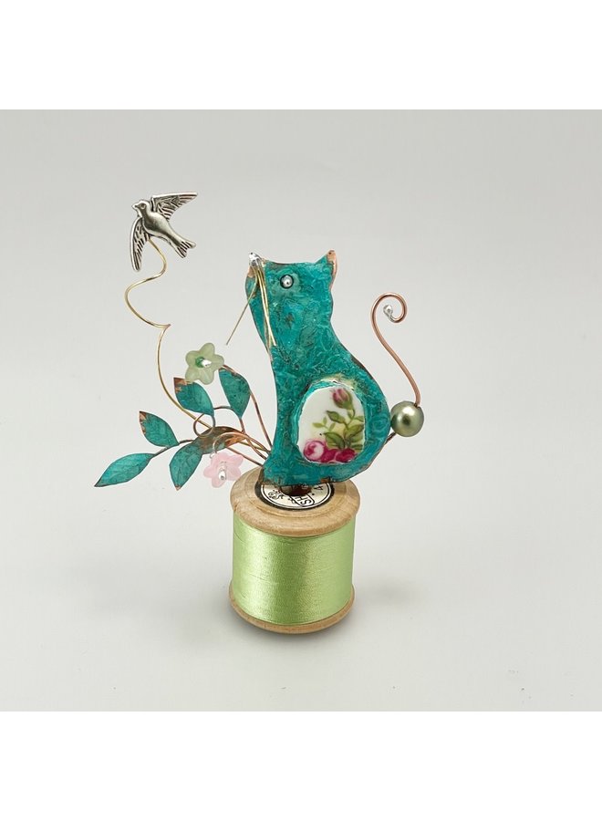 Gatito con Pájaro en Bobina 056