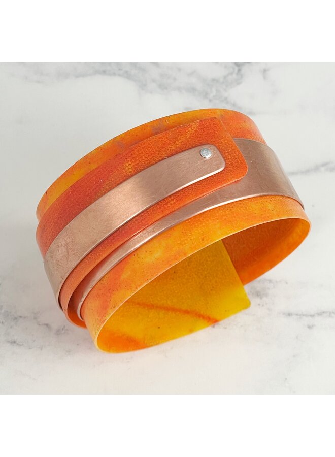 Verstellbare Manschette aus orangefarbenem Kupfer und Kunststoff 138