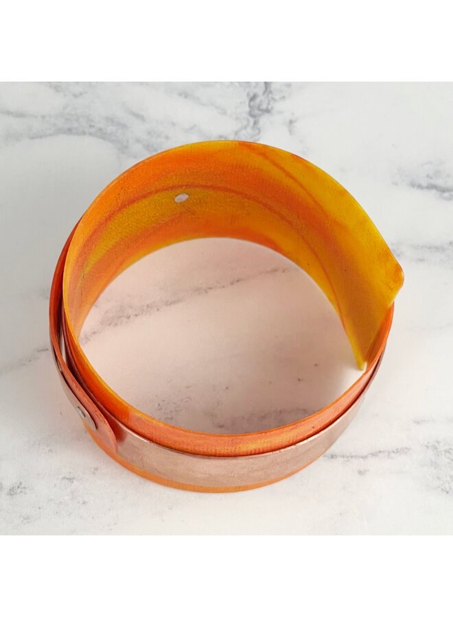 Orange justerbar manschett i koppar och plast 138