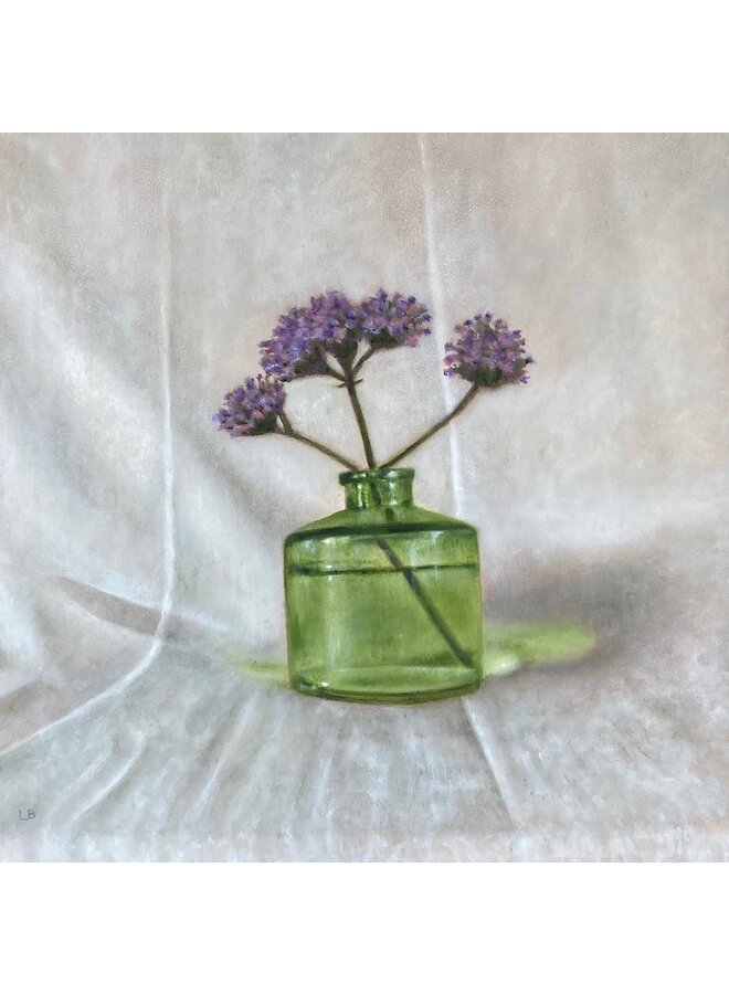 Verbine dans une bouteille verte