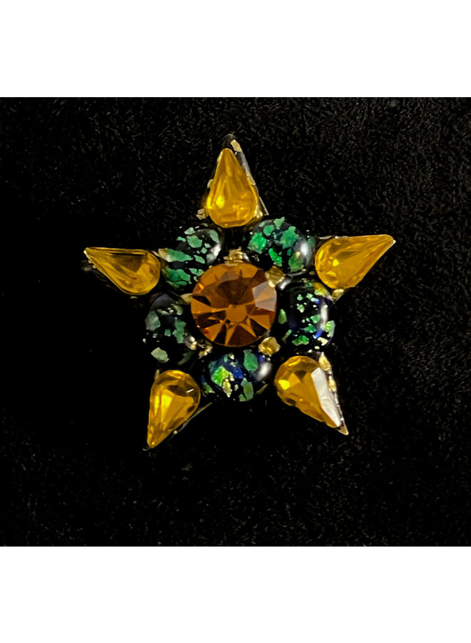 Liten stjärnbrosch i bärnsten 598