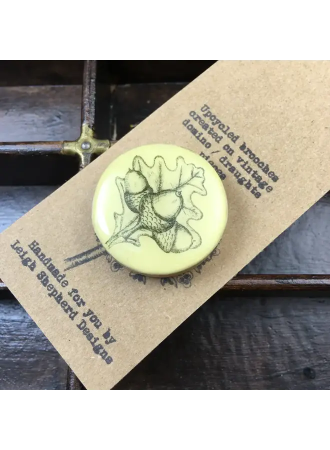 Acorn Draughts Piece Brooch on card  77