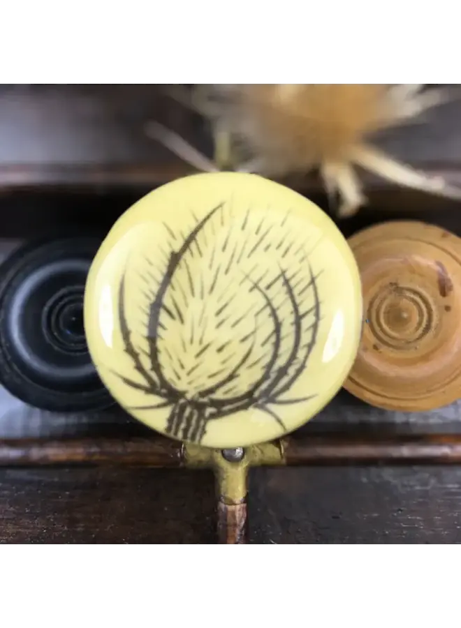 Teasel Draughts Piece Brooch on card  74