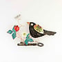 Blackbird with Strawberry on a Key