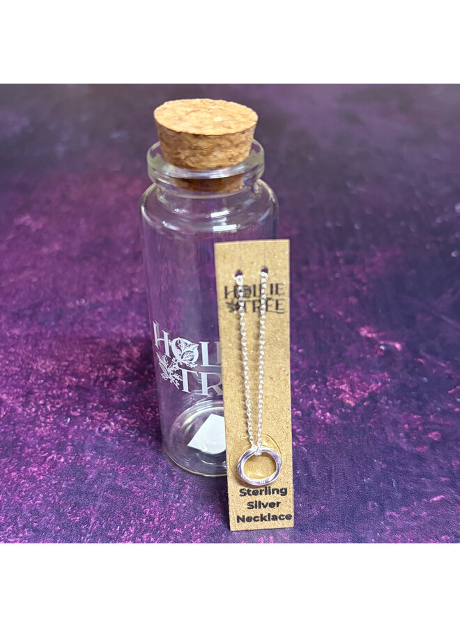 Gedrehte Kreis-Silberkette in einer Flasche 42