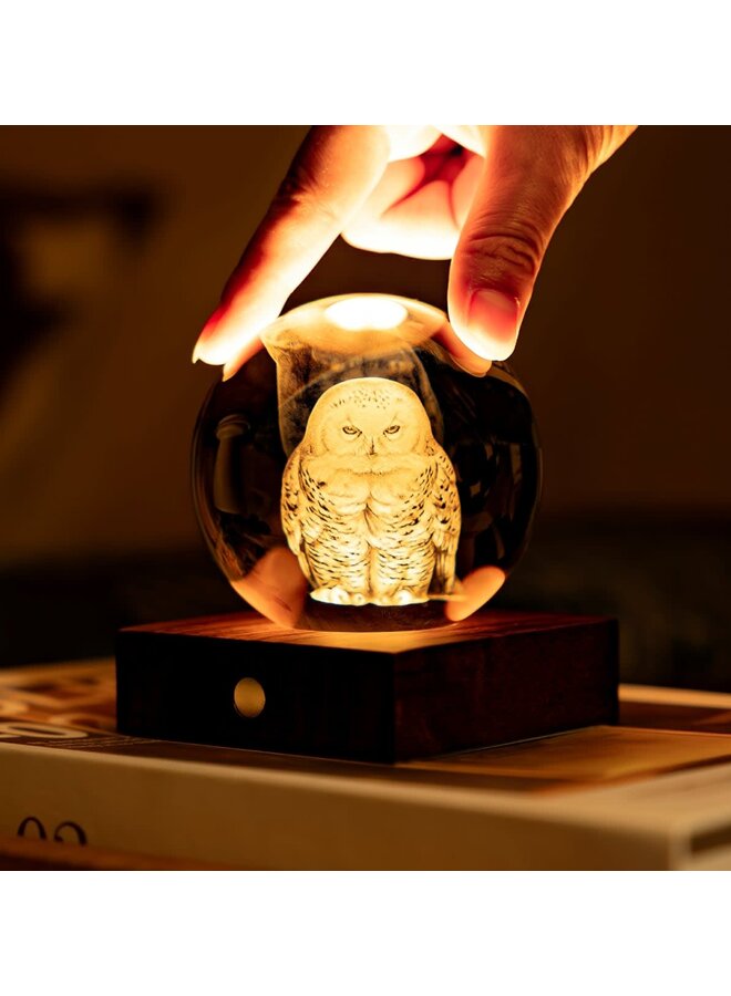Luz de cristal ámbar con forma de búho nival