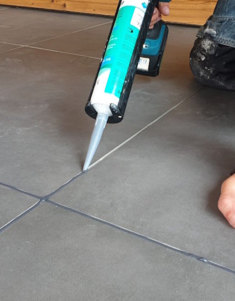 Elastic polymer joint with a cement look