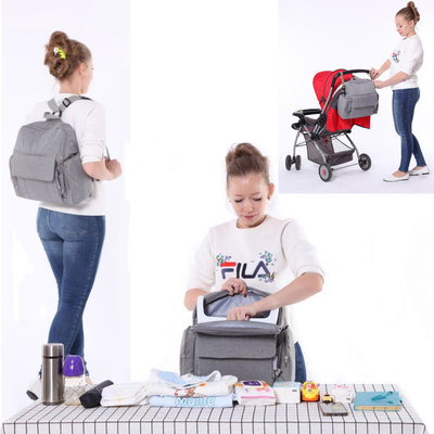 Decopatent 2-in-1 Luiertas / Baby Verzorgingstas met Zitverhoger - Rugzak Luiertas met ingebouwde Zitverhoger & veel vakken - Rugzak & Baby Stoel - Grote opberg Capaciteit - Luiertassen Unisex / Jongens / Meisjes - Kleur GRIJS - Decopatent®