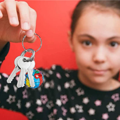 Decopatent Decopatent® Uitdeelcadeaus 48 STUKS Wereldbol Sleutelhangers - Traktatie Uitdeelcadeautjes voor kinderen - Klein Speelgoed