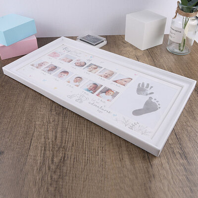 Decopatent Decopatent - Kinderfotolijst voor Voet en Hand Afdruk 1 tm 12 Maanden - Kinder Baby Fotolijst Eerste Jaar - My First Year Babyshower - Kraam Cadeau - Inclusief Inkt Stempel - 38 x 20 Cm - Wit