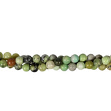 Magnetiet in serpentijn kralen rond 6 mm (streng van 40 cm) Magnetiet in serpentijn kralen rond 6 mm (streng van 40 cm)