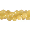 Calciet (oranje/geel) kralen rond 8 mm (streng van 40 cm) Calciet (oranje/geel) kralen rond 8 mm (streng van 40 cm)