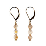 Gold filled oorbellen goudtopaas | 3 gefacetteerde bolletjes Gold filled oorbellen goudtopaas | 3 gefacetteerde bolletjes